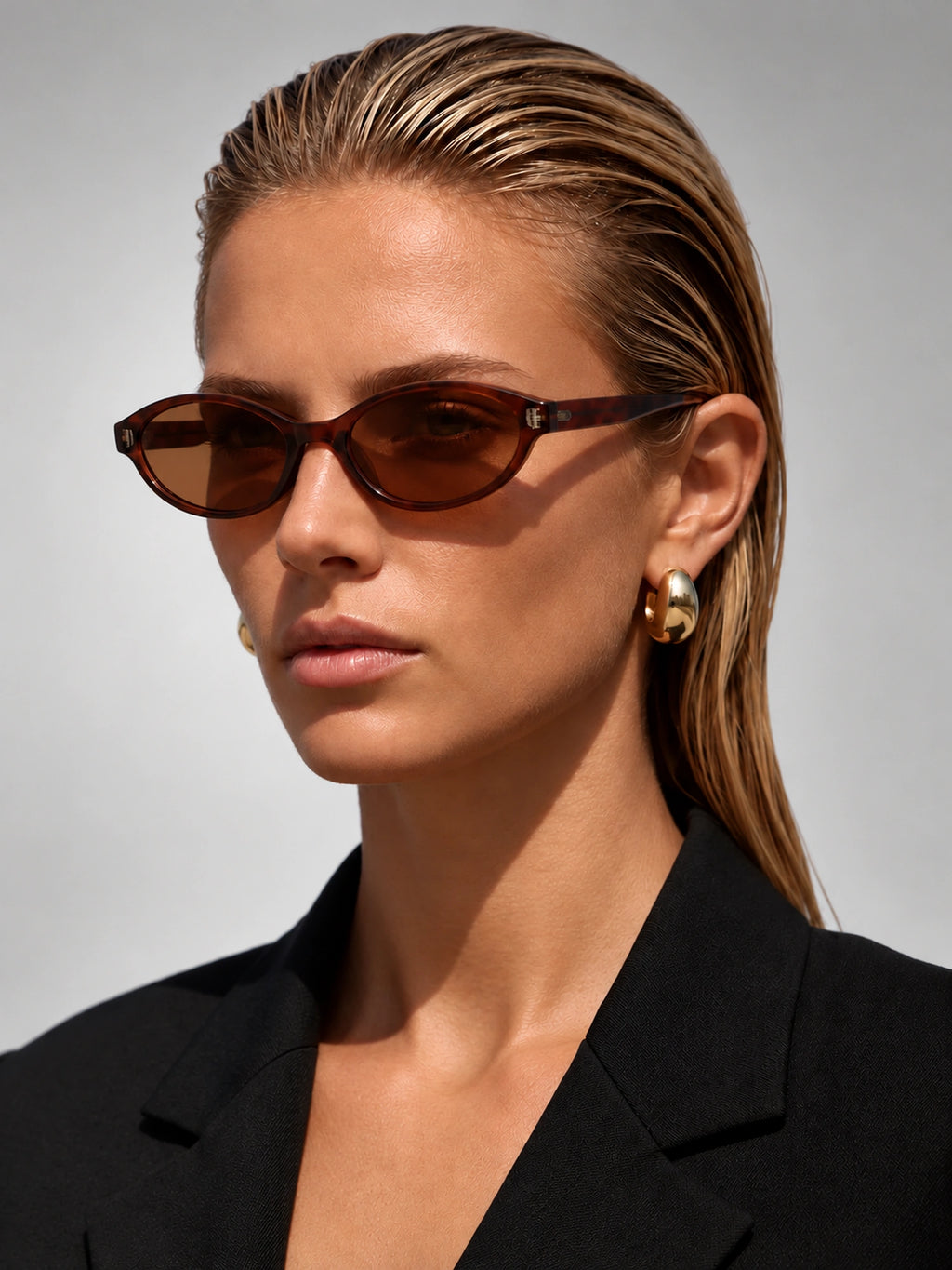 Women's Slim Oval Sunglasses – Retro Cat-Eye Frame in Tortoise/Brown — on model