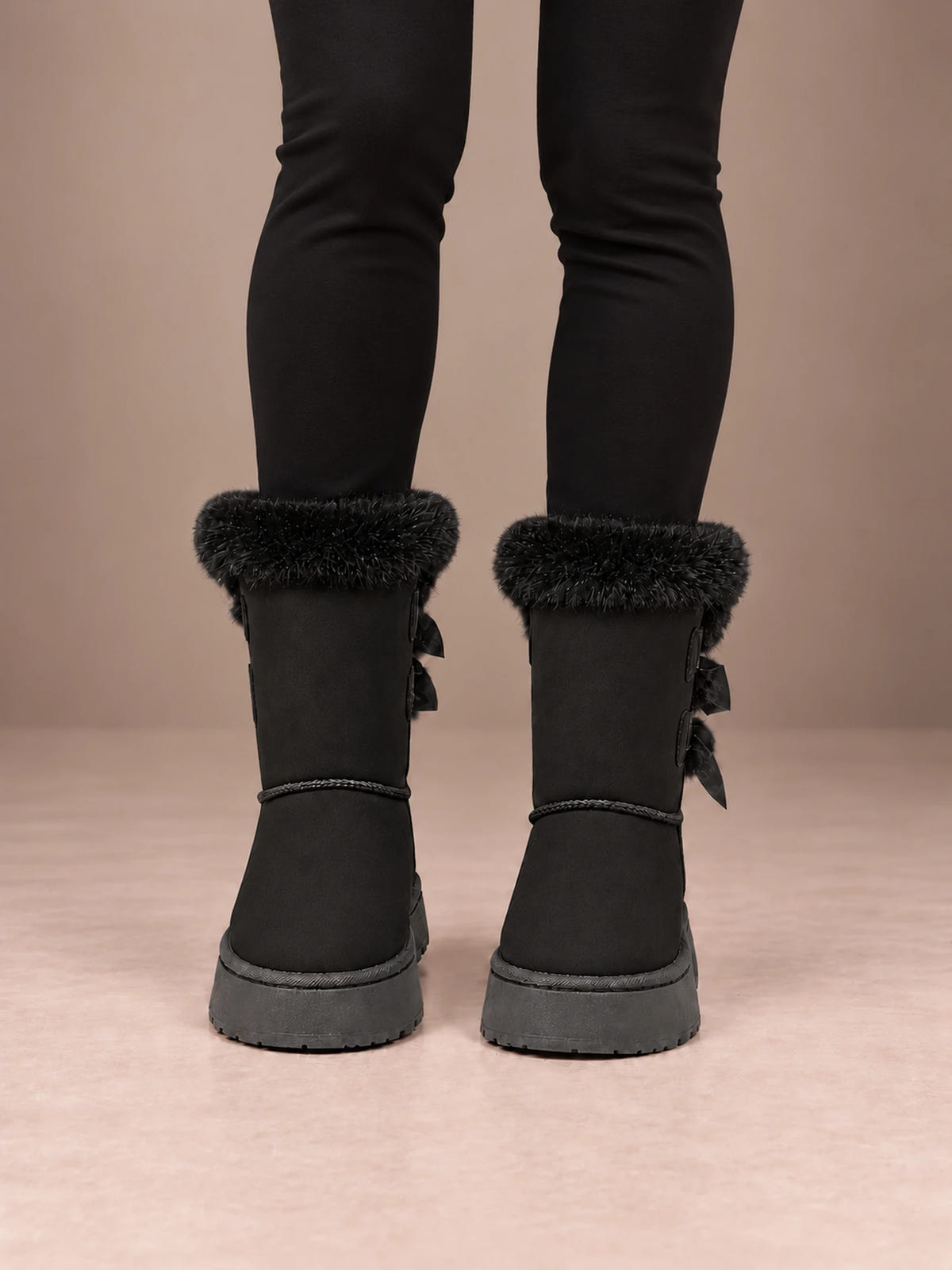 Women's Bow Detail Winter Boots – Fleece-Lined Platform Sole in Black, front view